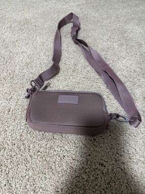 Dagne Dover Mauve Crossbody Wristlet